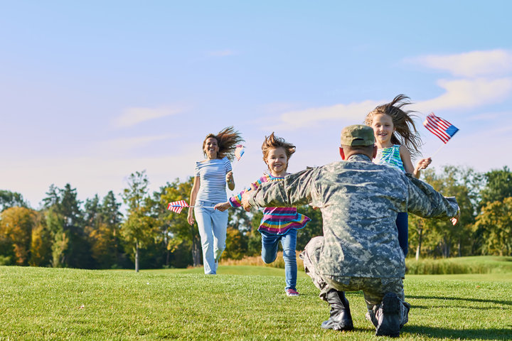 Military kids running to their dad
